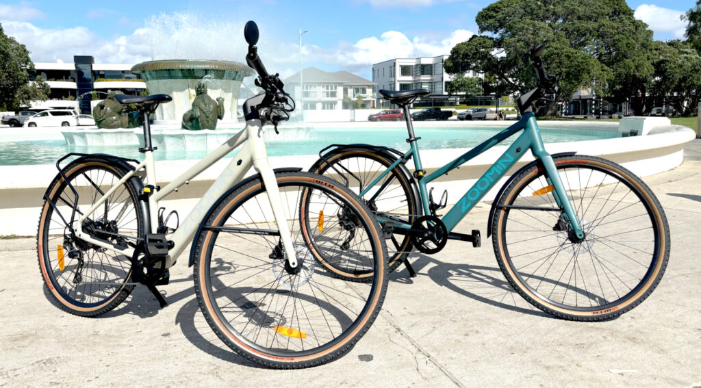 Zoomin electric bikes in Seashell and Teal colours